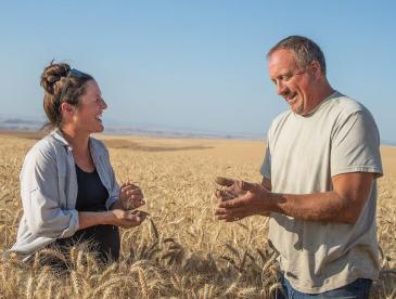 Cori Wittman and her cousin standing in a field