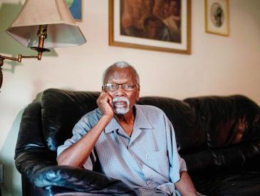 Resident Robert Taylor in a living room setting.