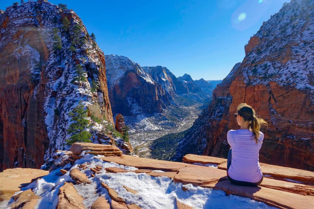 A woman sitting in a Utah valley