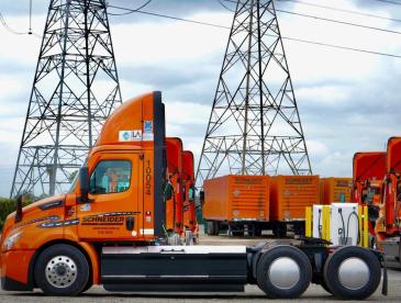 Orange trucks and electric chargers.